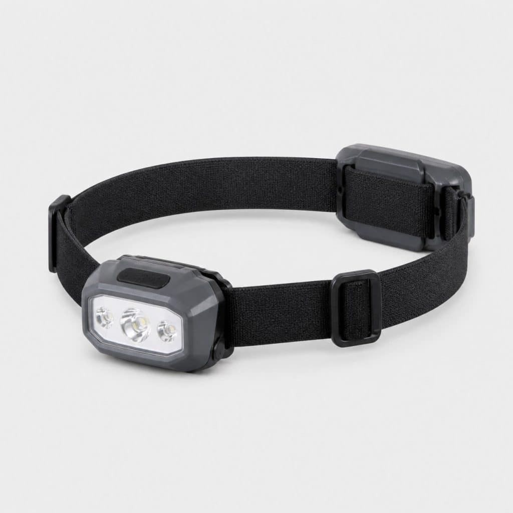 Lampe frontale hybride pile et rechargeable, vue de face sur fond clair